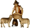 Shepherd feeding two sheep
