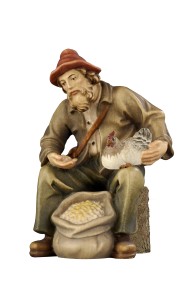 RA Shepherd sitting with grain and hen - color - 9 cm