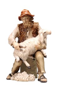 KO Pastore seduto con pecora - colorato - 9,5 cm