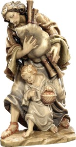 Bagpipe player with child