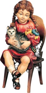 Sitting girl with cat on chair